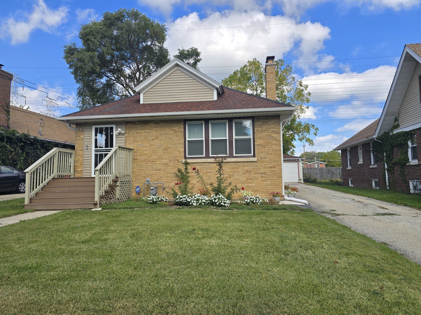 616 West Keith Avenue Waukegan, IL 60085 - Photo 19 of 19 a front view of a house with a yard