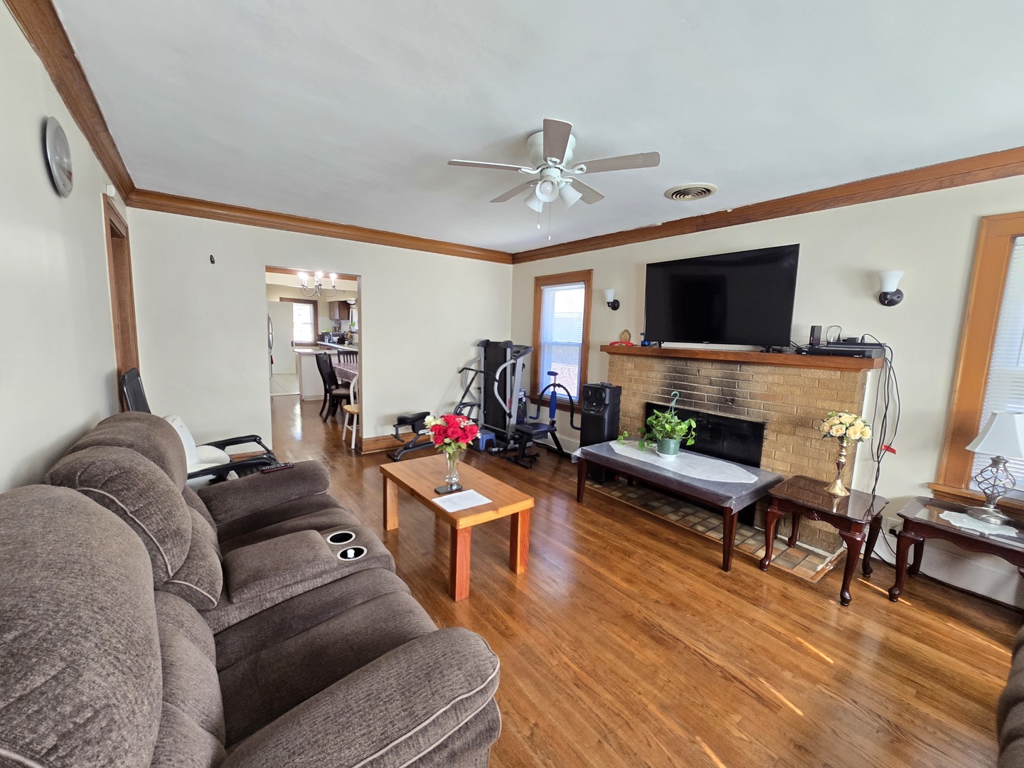 616 West Keith Avenue Waukegan, IL 60085 - Photo 3 of 19 a living room with furniture and a flat screen tv