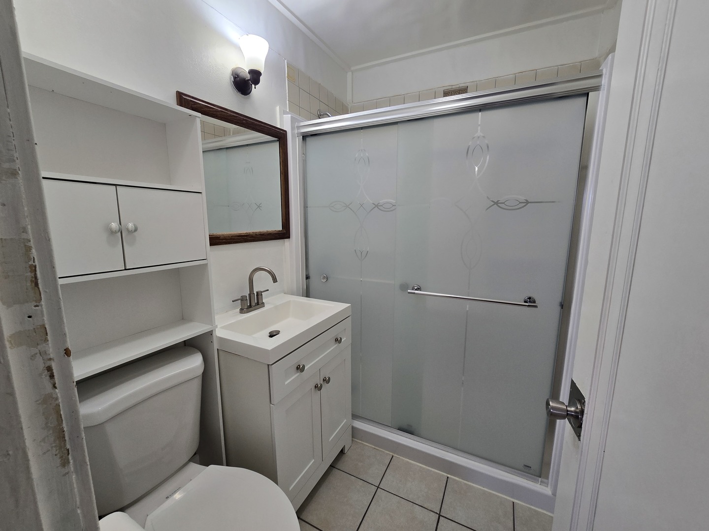 616 West Keith Avenue Waukegan, IL 60085 - Photo 10 of 19 a bathroom with a sink toilet and shower