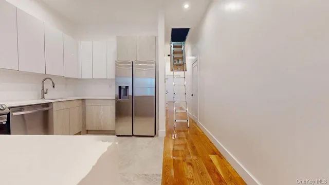a hallway with cabinets