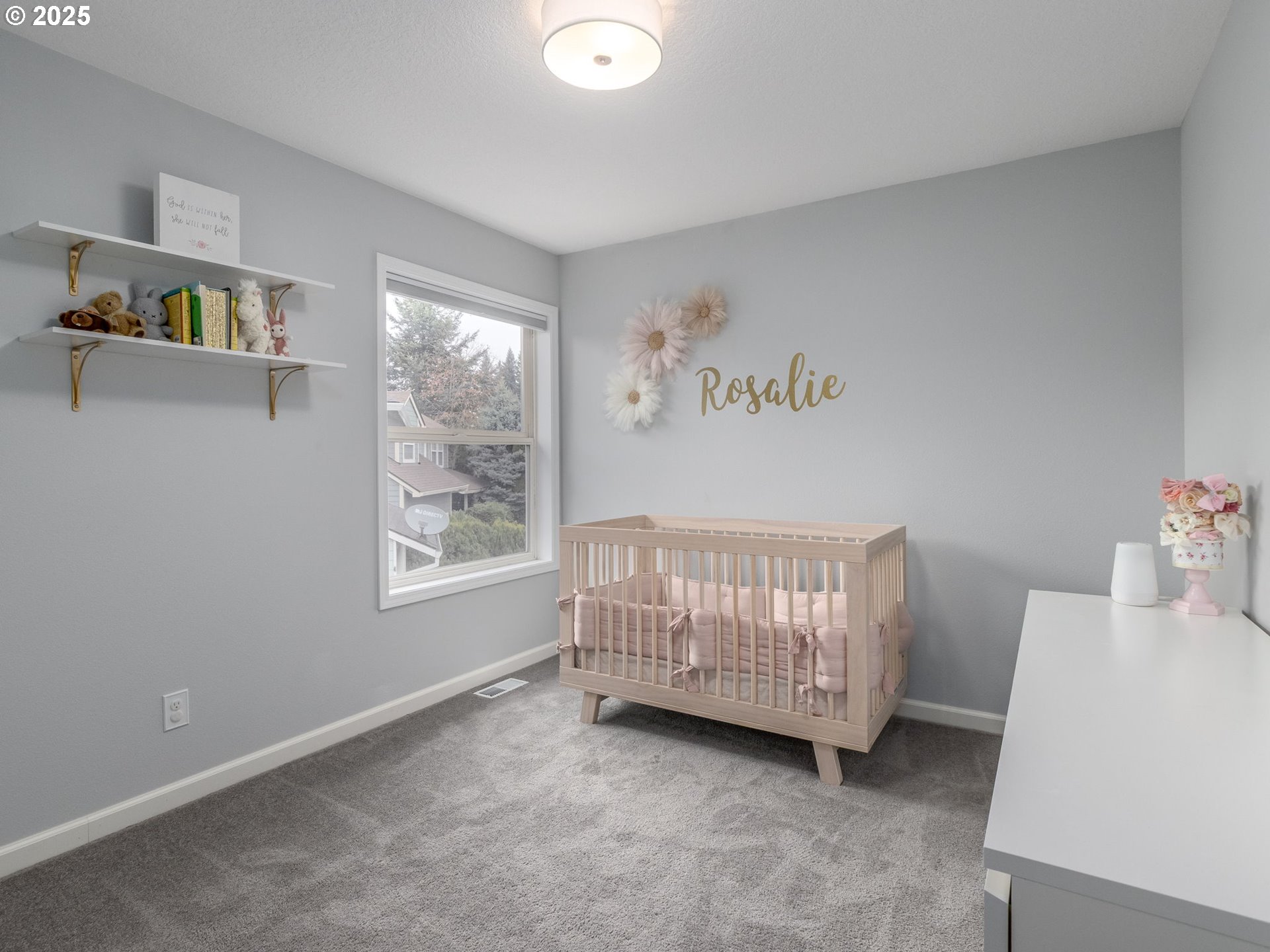 14140 Southwest Chehalem Court Tigard, OR 97223 - Photo 21 of 30 a room with a window and a baby bed