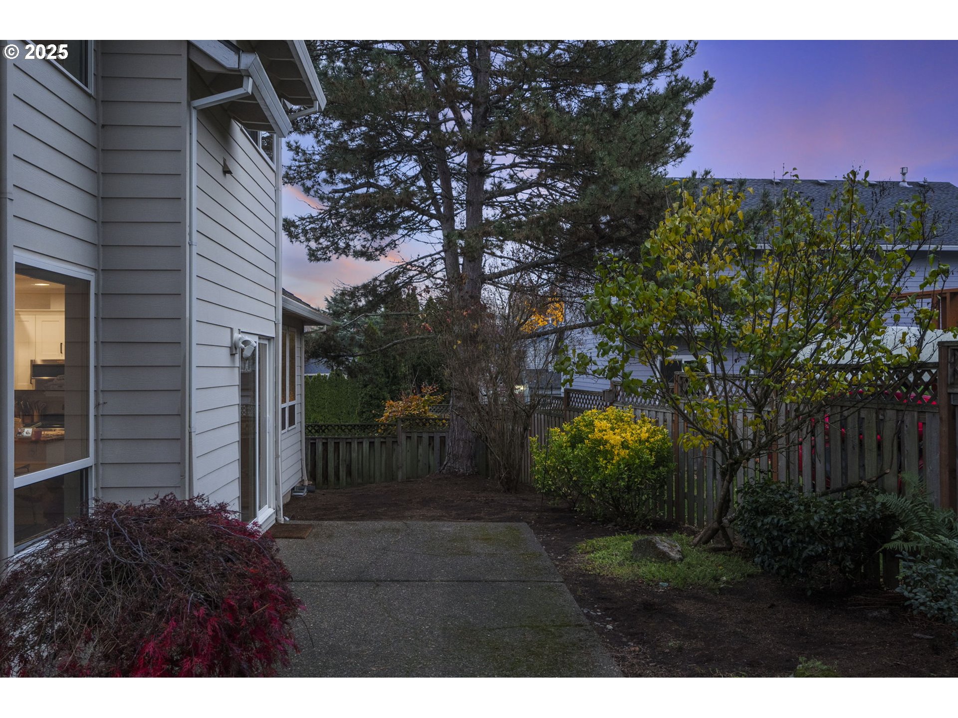 14140 Southwest Chehalem Court Tigard, OR 97223 - Photo 28 of 30 a backyard of a house with lots of green space