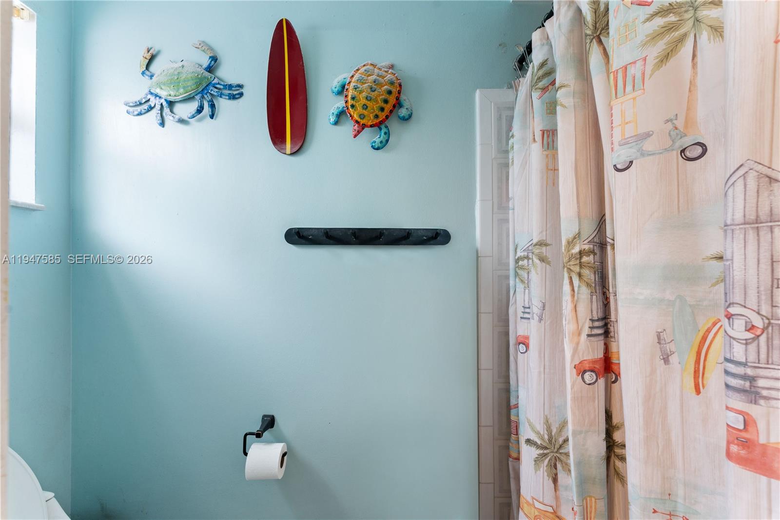 10100 Southwest 50th Court Cooper City, FL 33328 - Photo 14 of 24 a bathroom with a shower