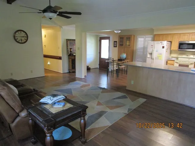 a living room with furniture and a table