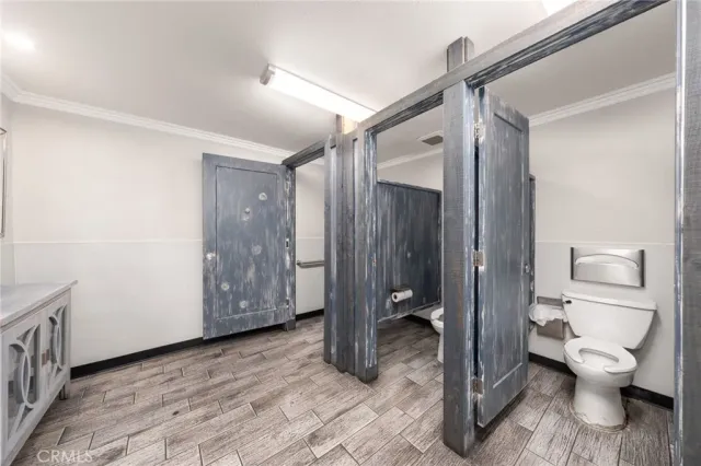 a large bathroom with a glass door shower