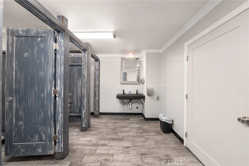 10026 Foothill Boulevard Rancho Cucamonga, CA 91730 - Photo 13 of 34 a large bathroom with a glass door shower
