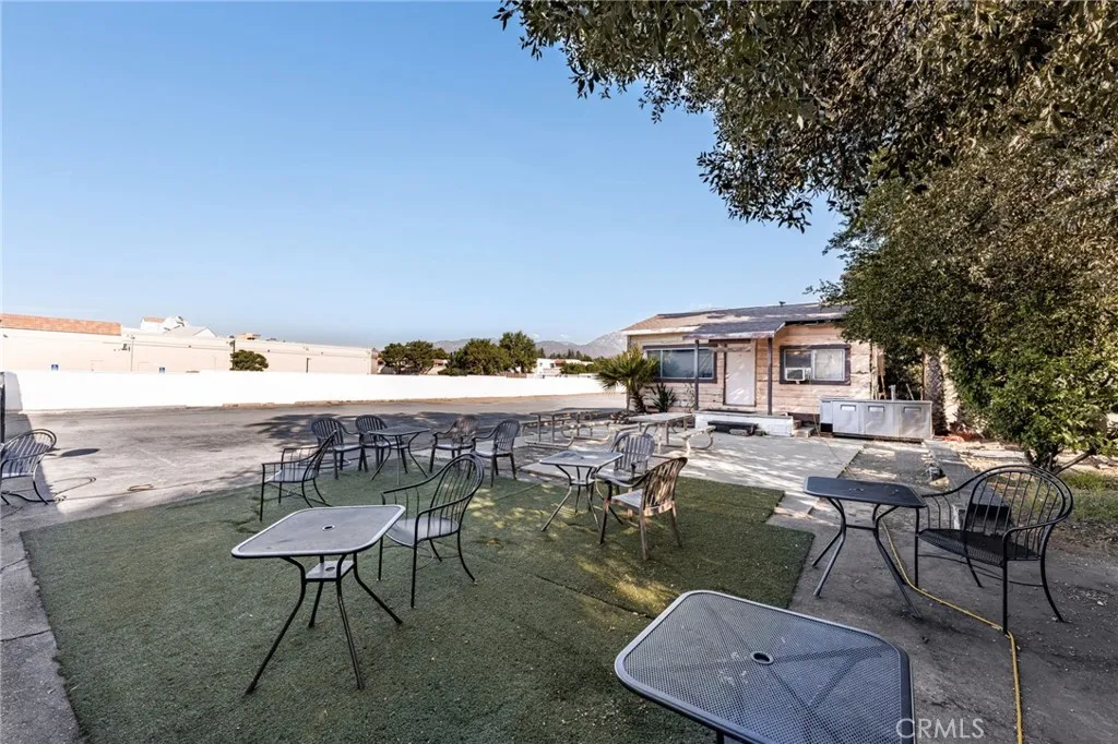 10026 Foothill Boulevard Rancho Cucamonga, CA 91730 - Photo 17 of 34 a view of a chairs and table in patio