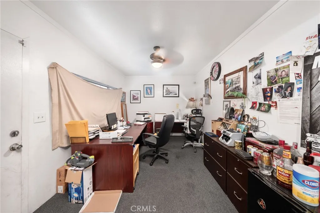 10026 Foothill Boulevard Rancho Cucamonga, CA 91730 - Photo 18 of 34 a room with gym equipment and a large window