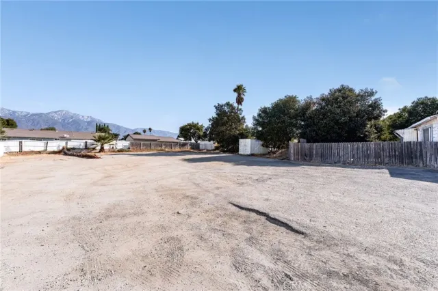 a view of a town with big trees