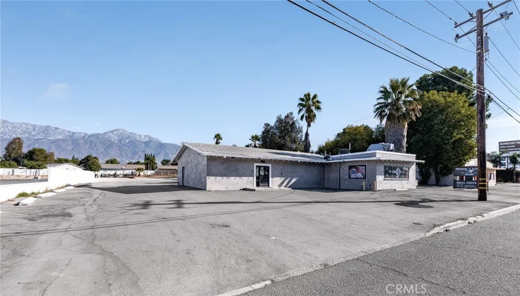 10026 Foothill Boulevard Rancho Cucamonga, CA 91730 - Photo 29 of 34 a view of a house with a outdoor space
