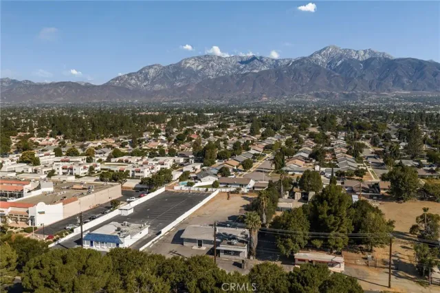a front view of a house with a road