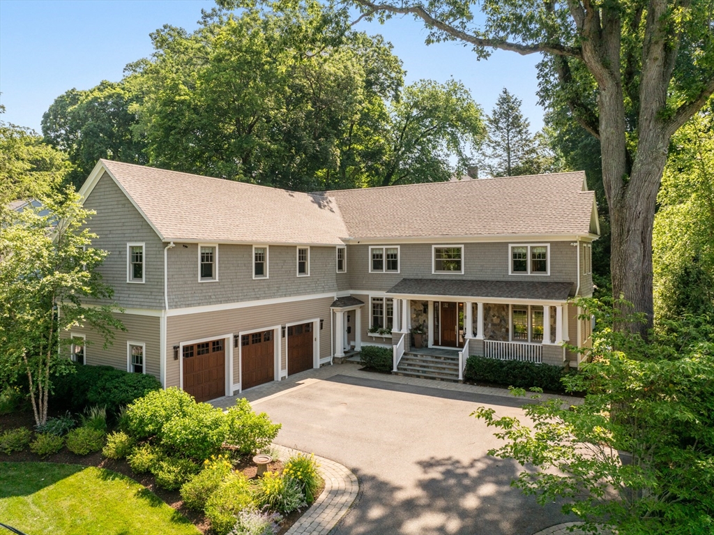 8 Sherburne Road Lexington, MA 02421 - Photo 1 of 35 a aerial view of a house with a yard and potted plants