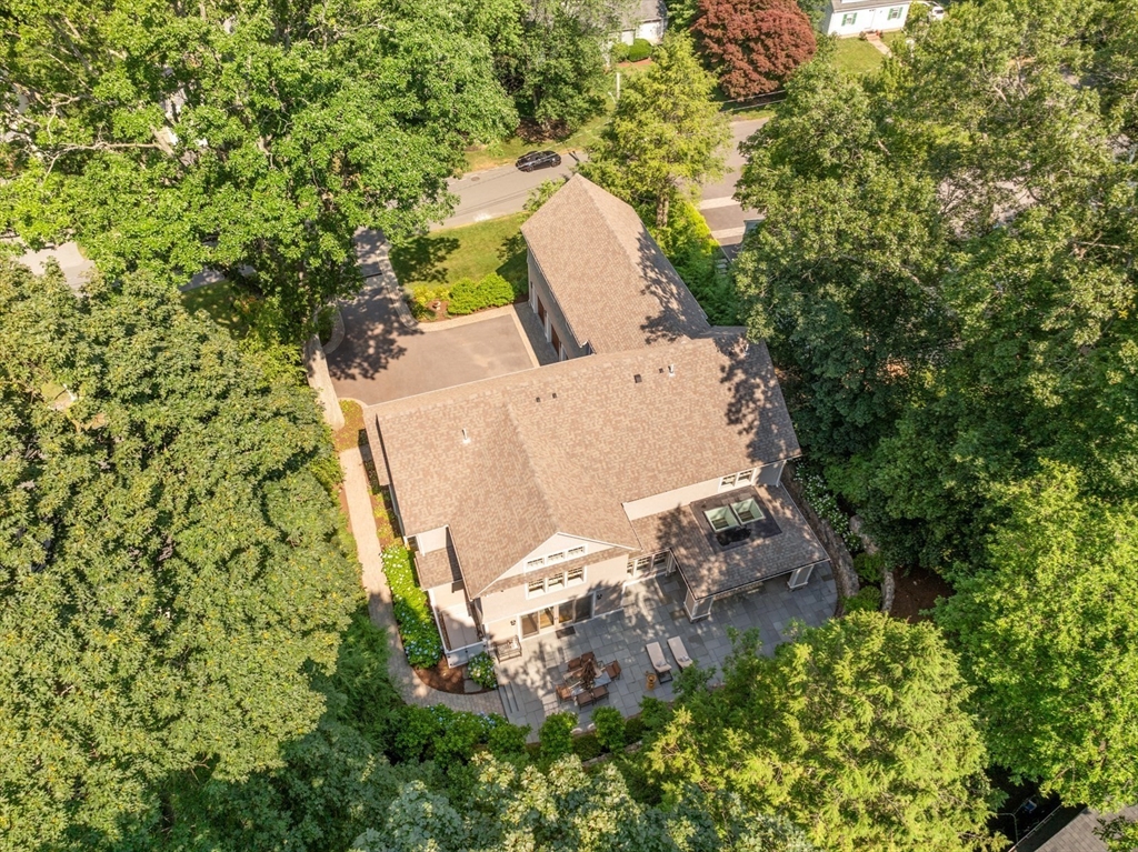 8 Sherburne Road Lexington, MA 02421 - Photo 35 of 35 an aerial view of a house with a yard and large trees