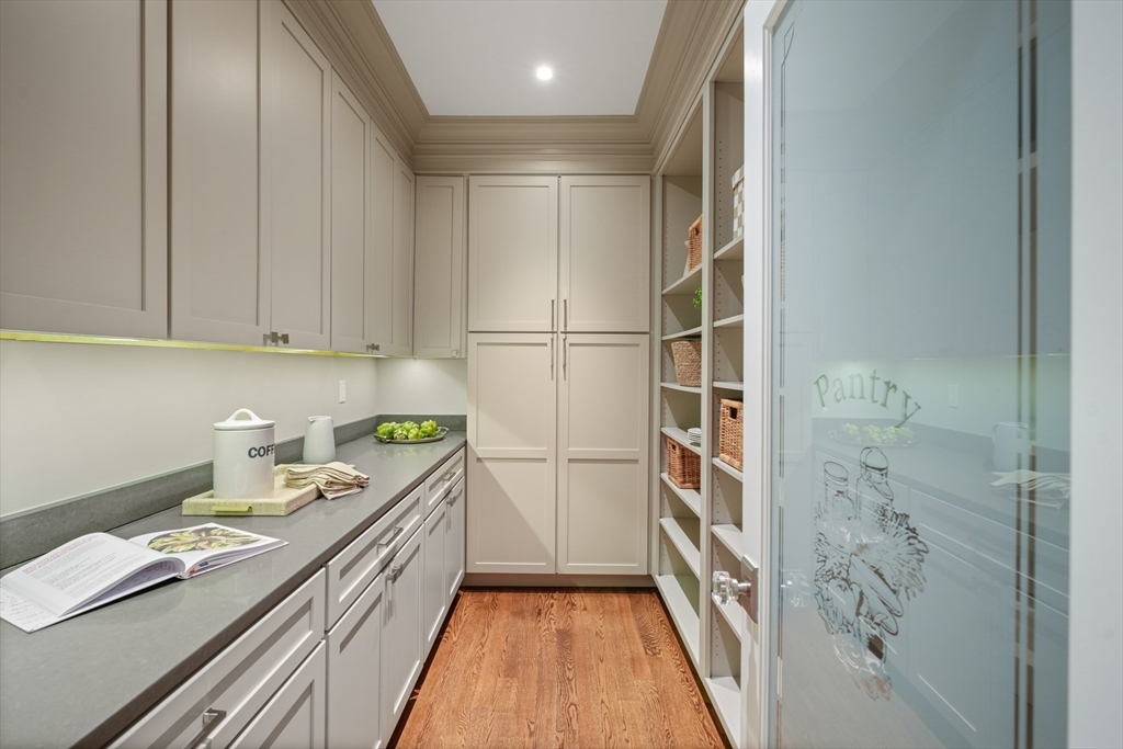 8 Sherburne Road Lexington, MA 02421 - Photo 10 of 35 a kitchen with a refrigerator and countertop