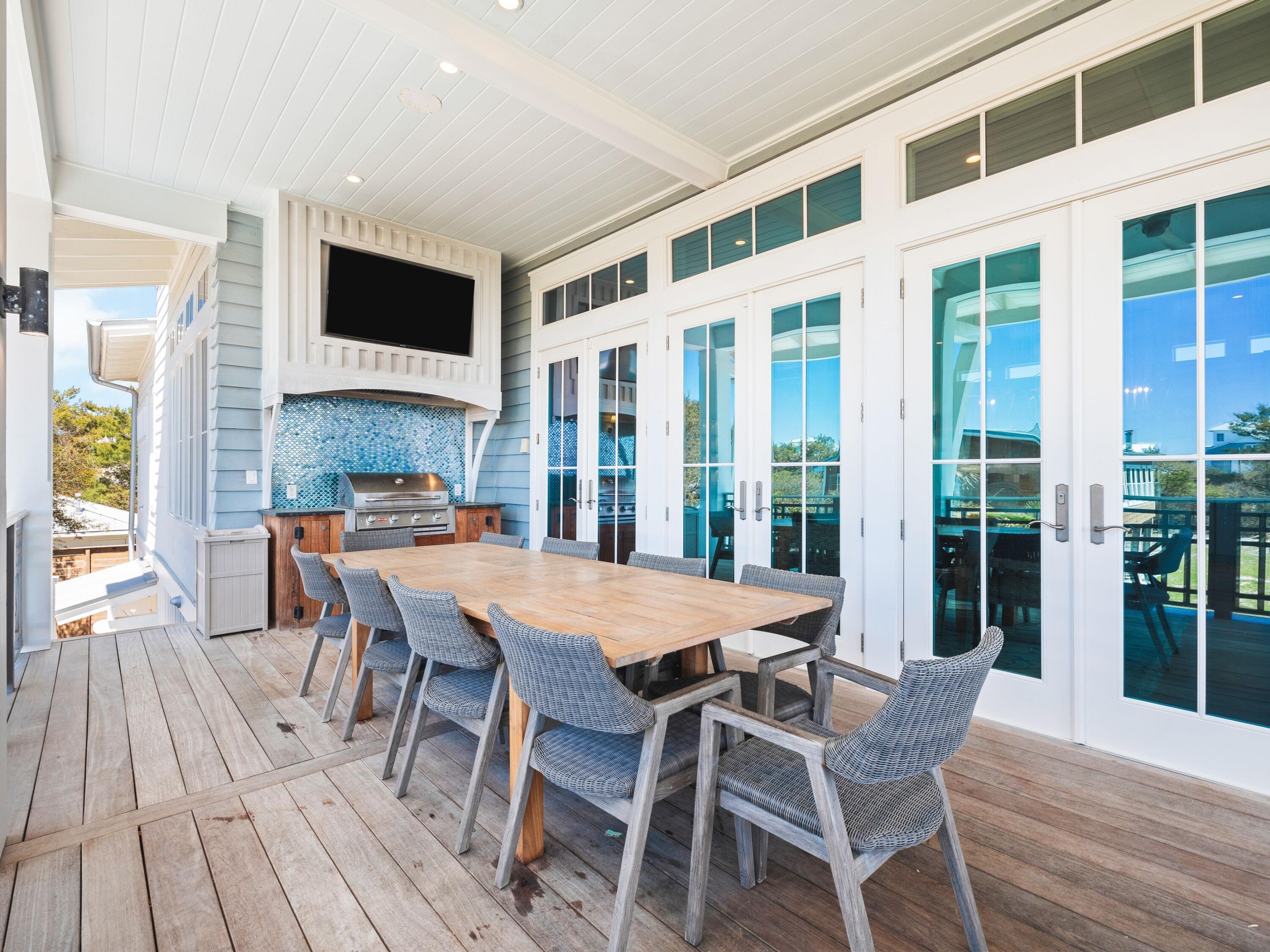 178 Pompano Street Inlet Beach, FL 32461 - Photo 24 of 49 a view of a dining room with furniture window and wooden floor