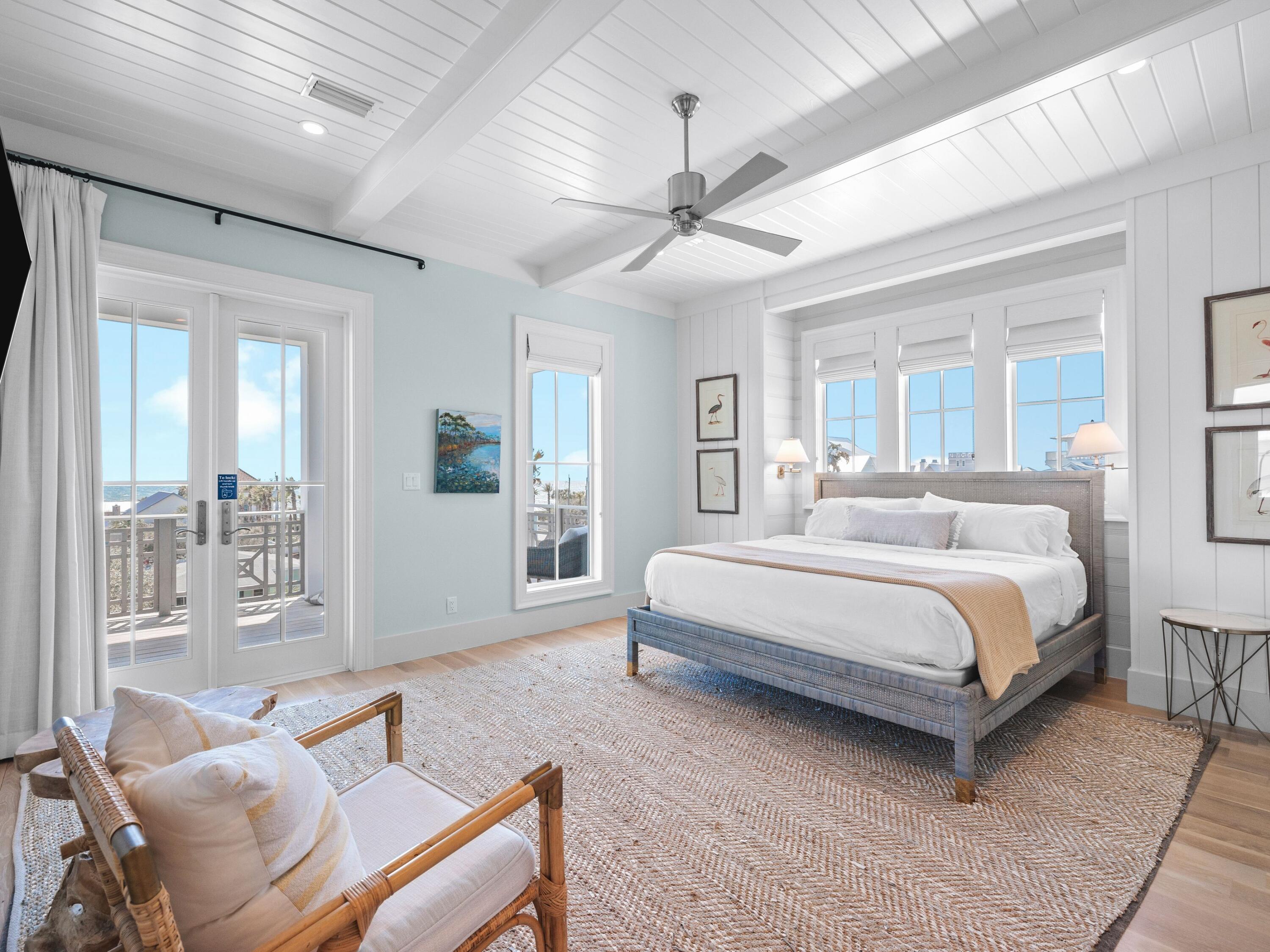 178 Pompano Street Inlet Beach, FL 32461 - Photo 27 of 49 a bedroom with a large bed couch and windows