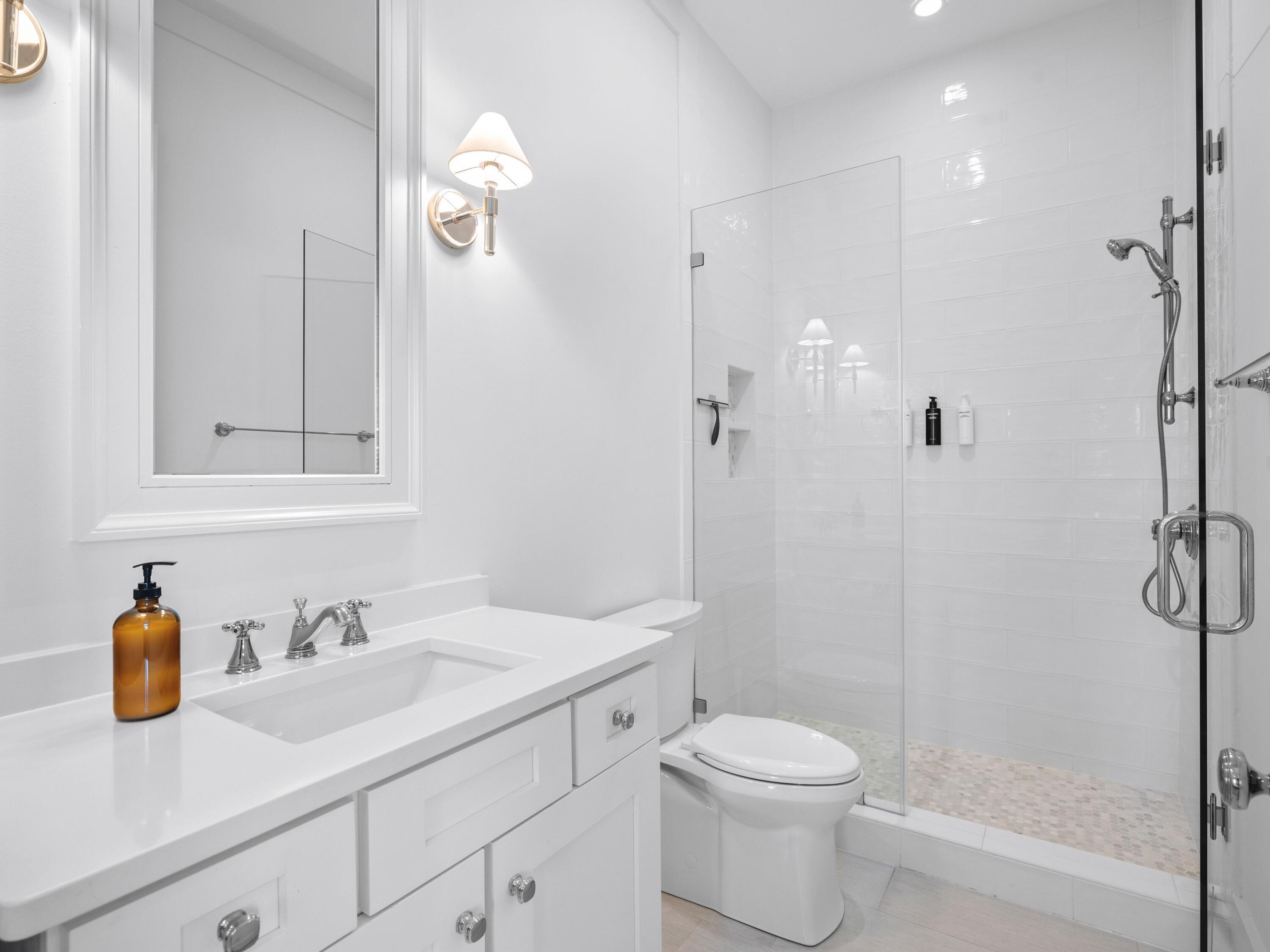 178 Pompano Street Inlet Beach, FL 32461 - Photo 40 of 49 a bathroom with a sink a toilet and shower