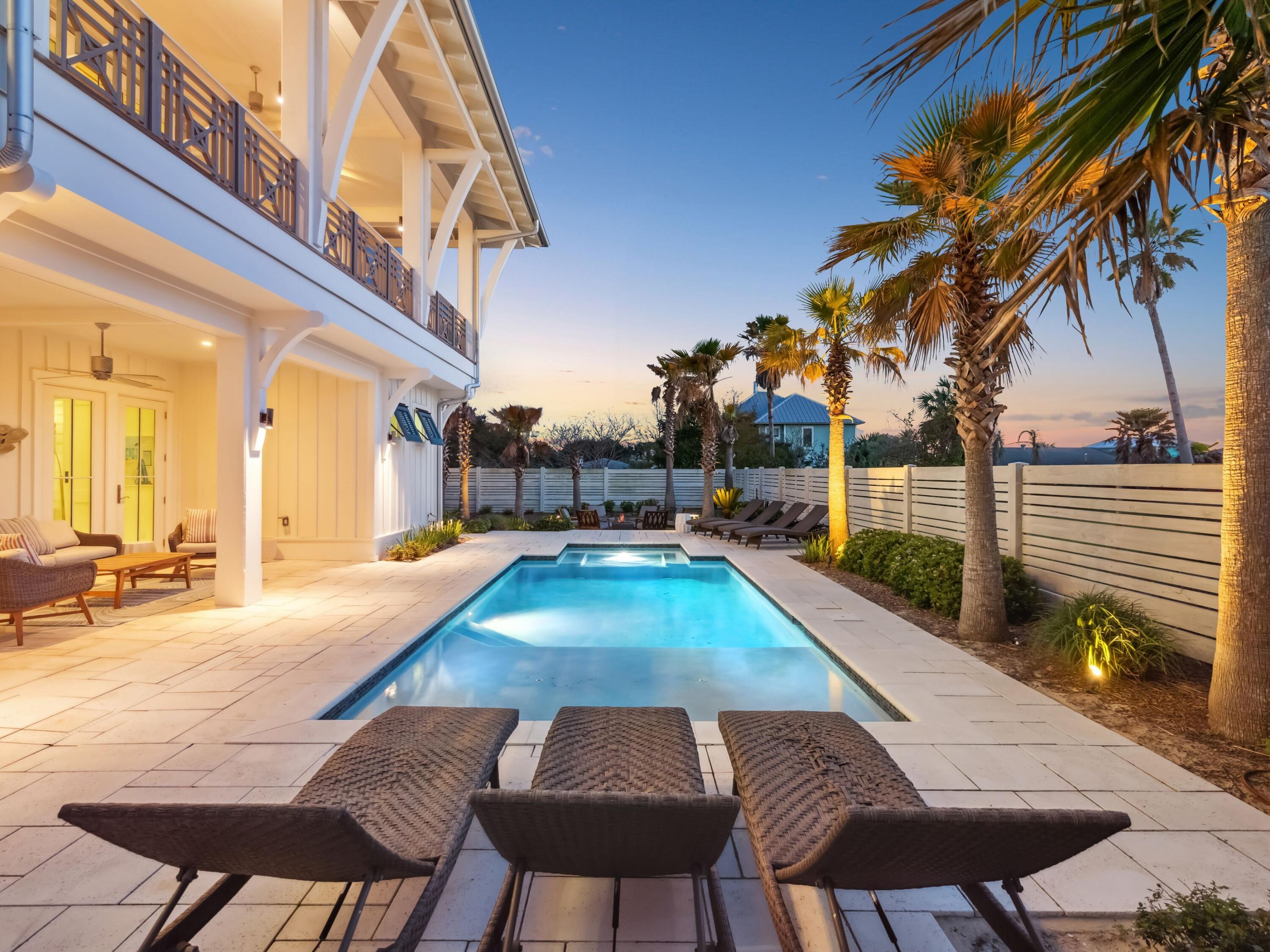 178 Pompano Street Inlet Beach, FL 32461 - Photo 8 of 49 a view of a swimming pool with a lounge chairs