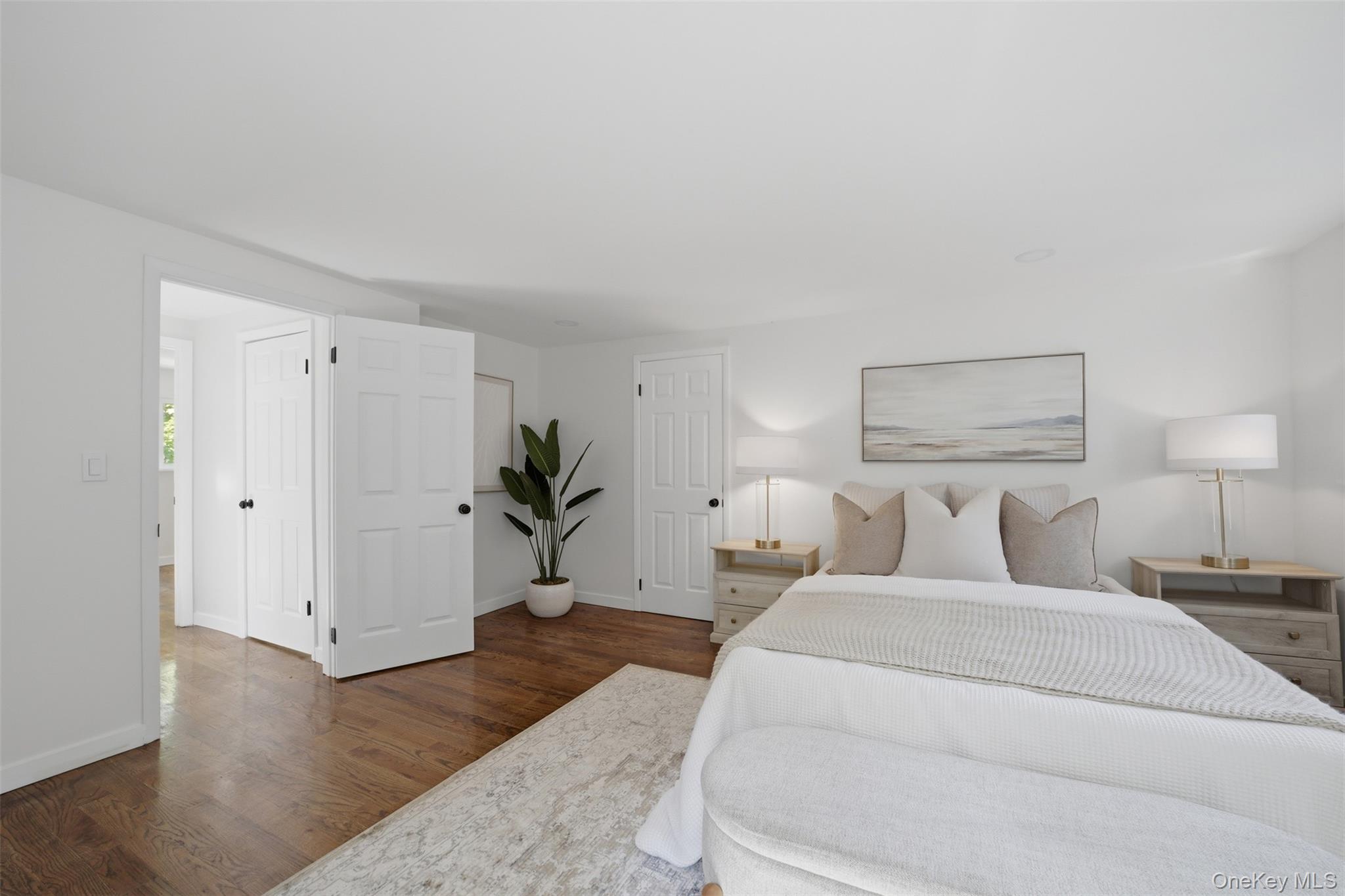 24 Fuller Road Ossining, NY 10562 - Photo 26 of 48 a bed room with a bed and a night stand