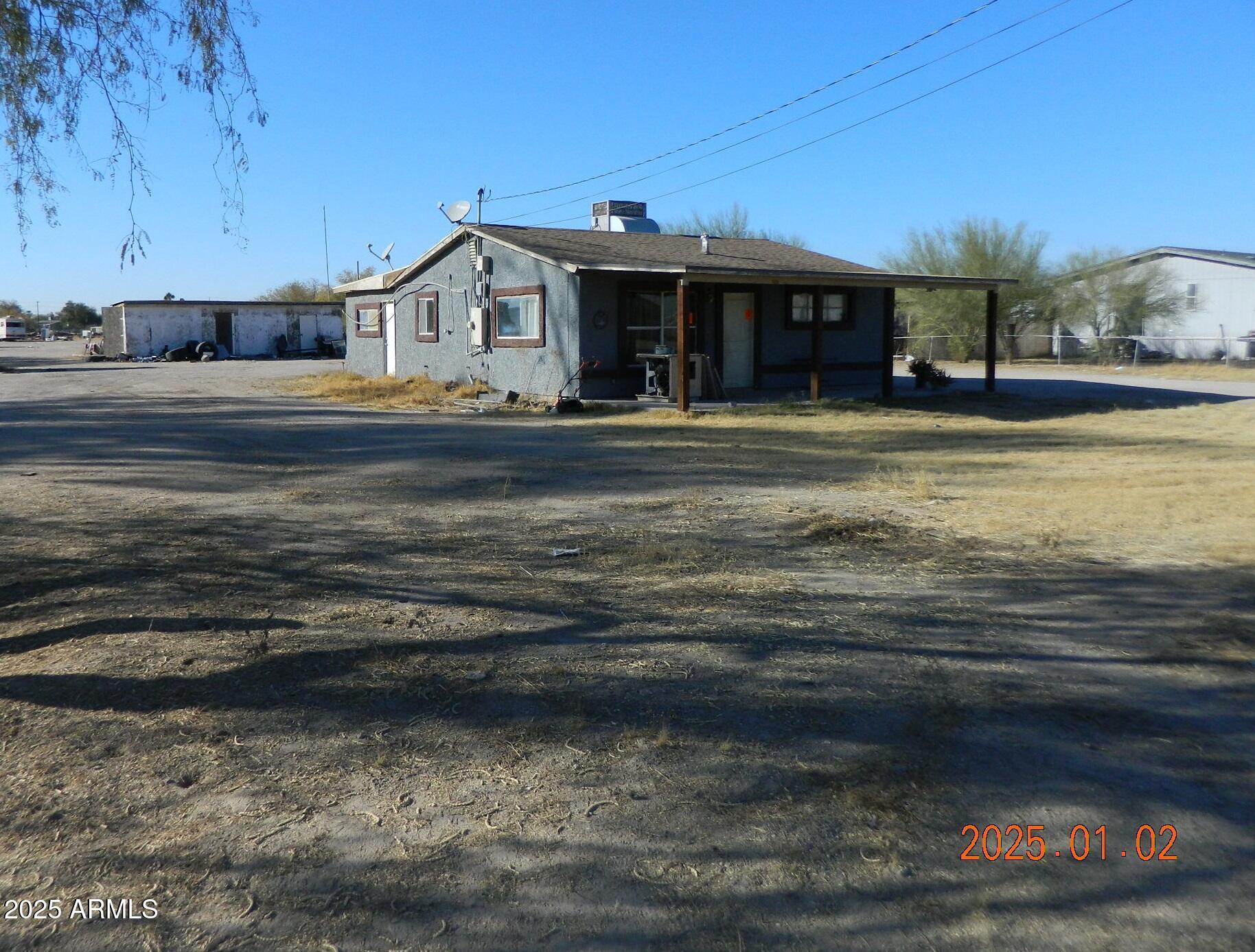 218 North Apache Road Buckeye, AZ 85326 - Photo 6 of 9 SE Corner 2025Jan2