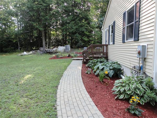 253 NW Road Westhampton, MA 01027 - Photo 14 of 16 a view of a backyard with sitting area