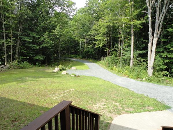 253 NW Road Westhampton, MA 01027 - Photo 15 of 16 a view of a yard with an outdoor space