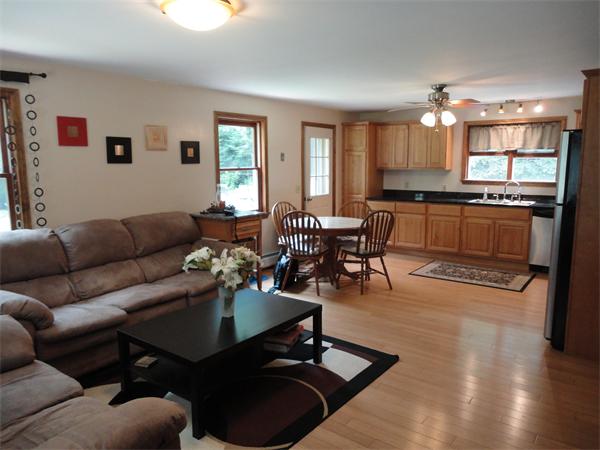 253 NW Road Westhampton, MA 01027 - Photo 2 of 16 a living room with furniture a dining table and kitchen view