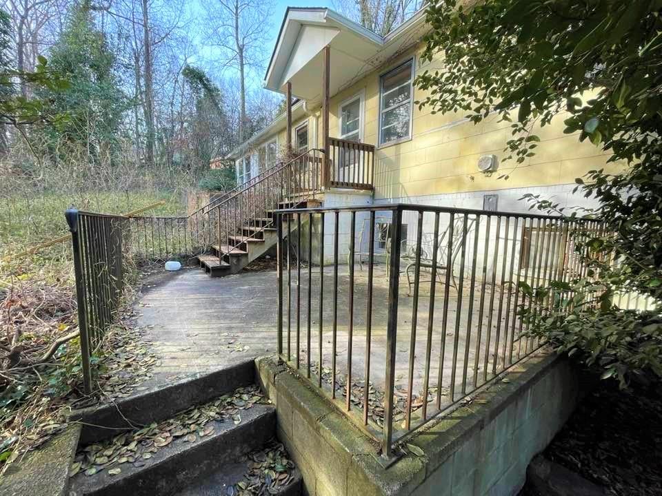 700 New Market Road Tryon, NC 28782 - Photo 36 of 44 a view of a porch with a yard