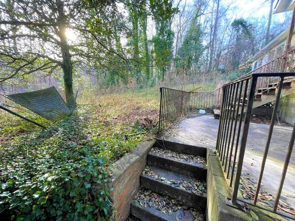 700 New Market Road Tryon, NC 28782 - Photo 37 of 44 a view of a garden with wooden floor
