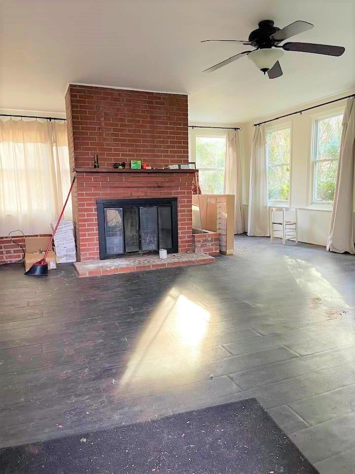 700 New Market Road Tryon, NC 28782 - Photo 6 of 44 a view of livingroom with fireplace and window