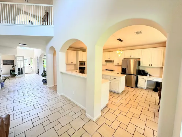swimming pool with a garden and outdoor seating