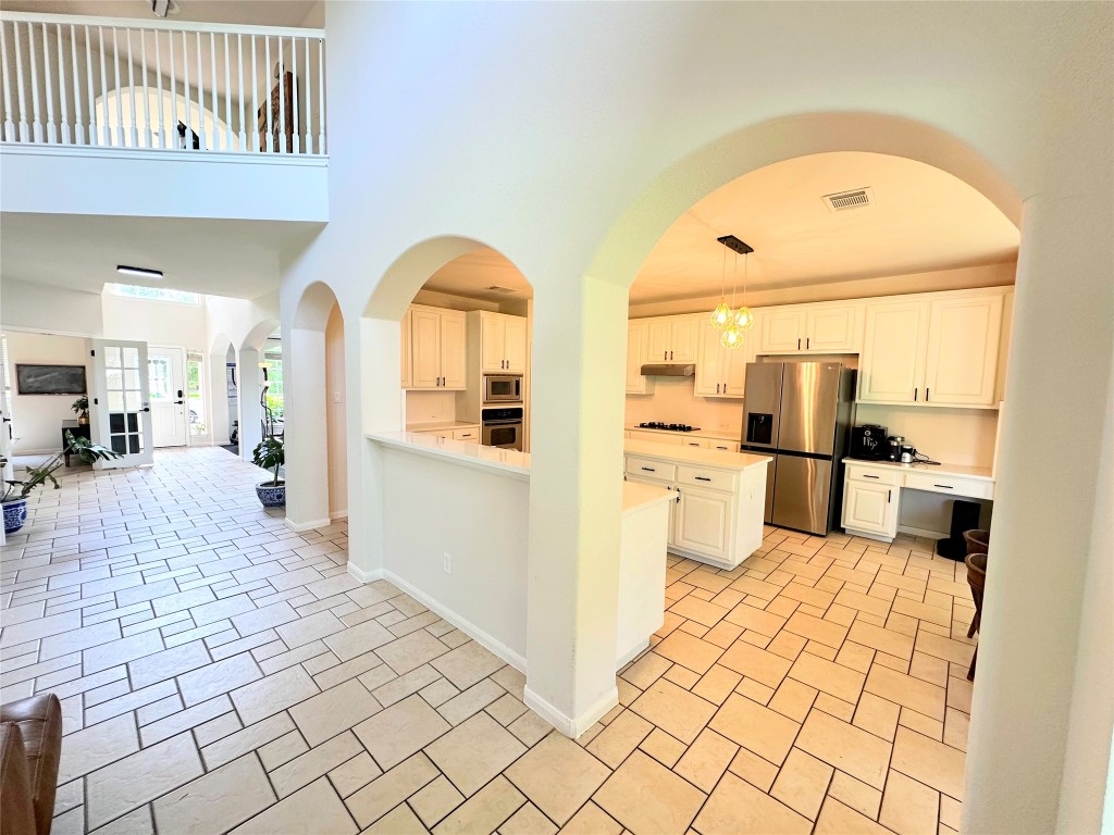 12504 Gun Metal Drive Austin, TX 78739 - Photo 40 of 40 a view of a living room with a wooden floor