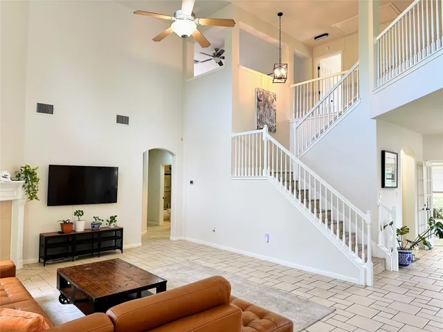 a view of a living room with a wooden floor