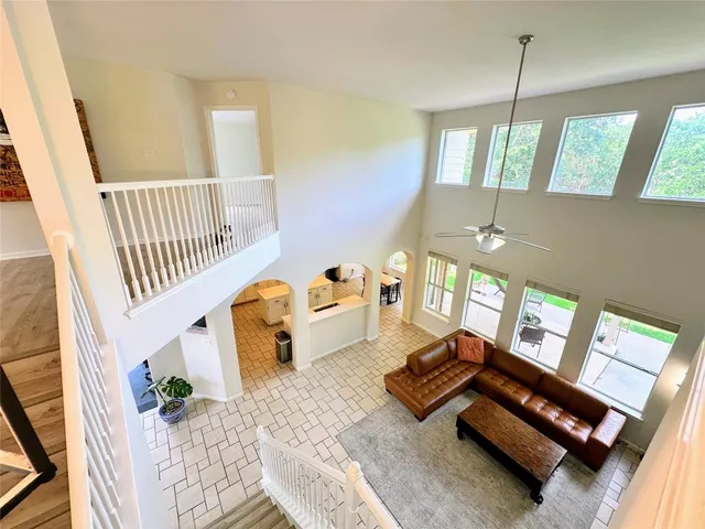 a living room with furniture fireplace and a fireplace
