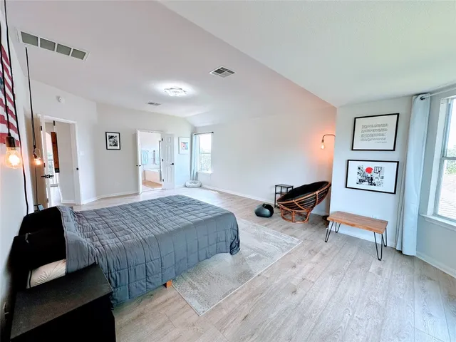 wooden floor in a hall with an entryway