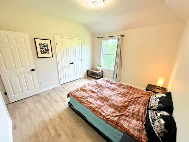 a bathroom with a toilet a sink and a mirror