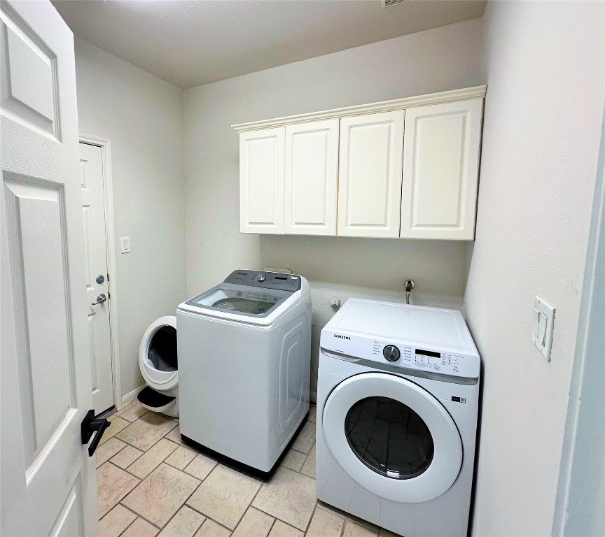 12504 Gun Metal Drive Austin, TX 78739 - Photo 35 of 40 a utility room with dryer and washer