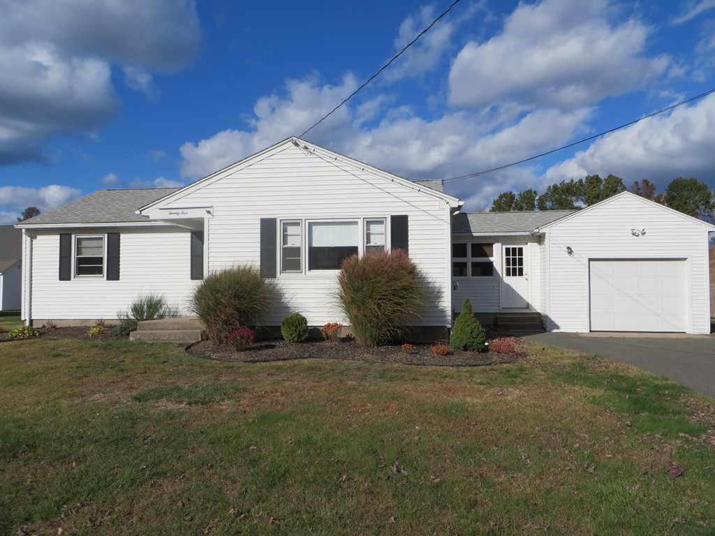 25 Duke Street West Springfield, MA 01089 - Photo 1 of 12 a view of a house with a yard