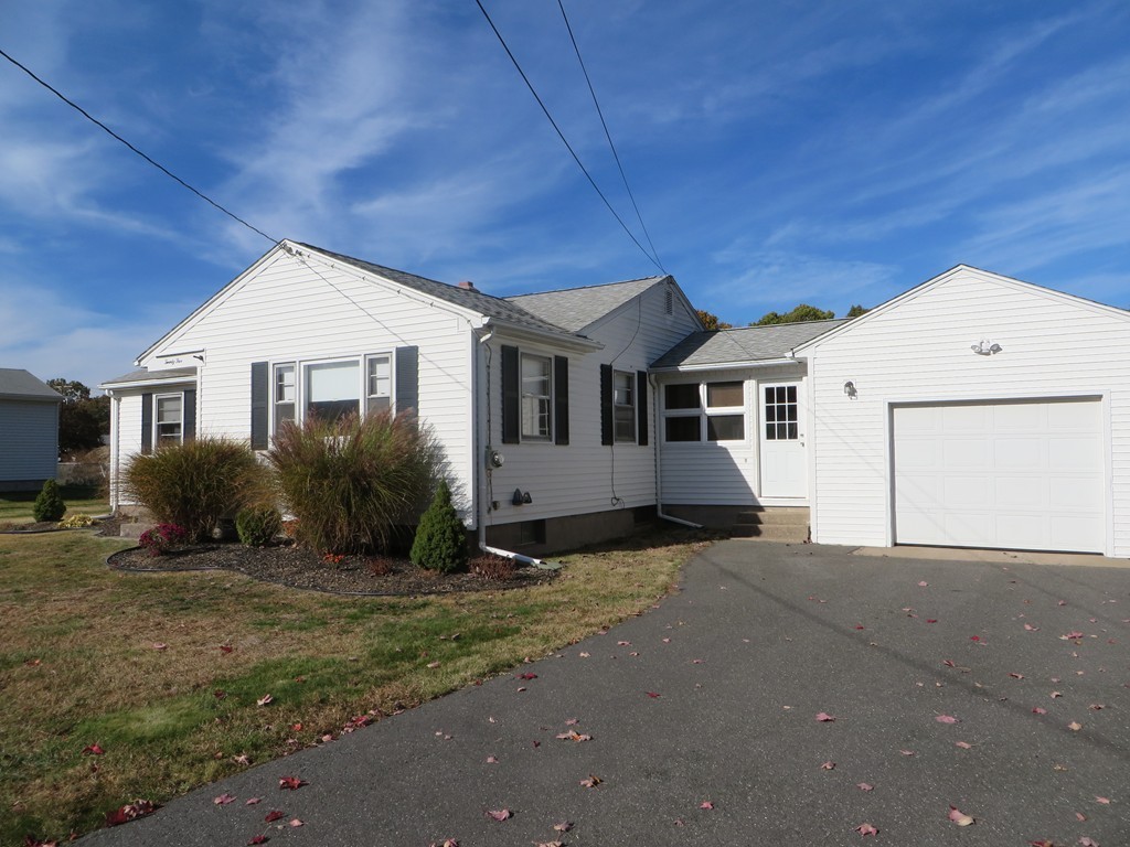 25 Duke Street West Springfield, MA 01089 - Photo 3 of 12 a front view of a house with a yard