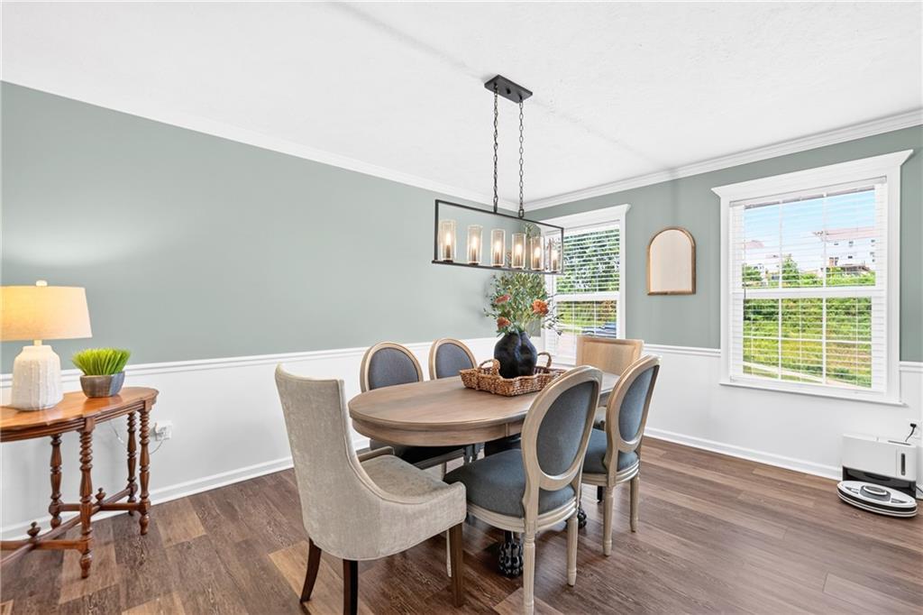 259 Foxwood Road Coraopolis, PA 15108 - Photo 22 of 49 The space flows effortlessly into the adjoining kitchen and living areas, striking the perfect balance between formal charm and everyday convenience.