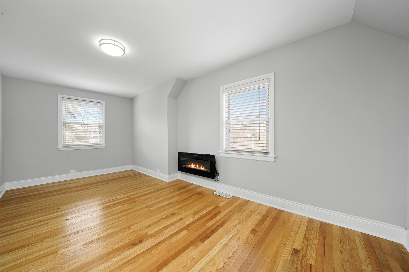 1643 183rd Street Homewood, IL 60430 - Photo 21 of 44 a view of empty room with wooden floor and fan