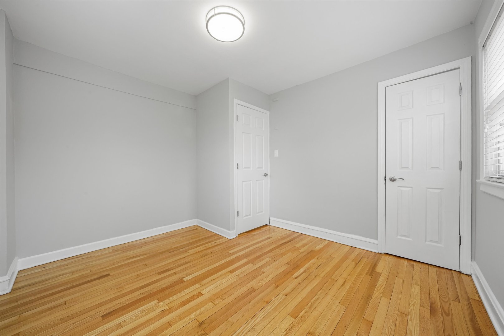 1643 183rd Street Homewood, IL 60430 - Photo 22 of 44 a view of empty room with wooden floor