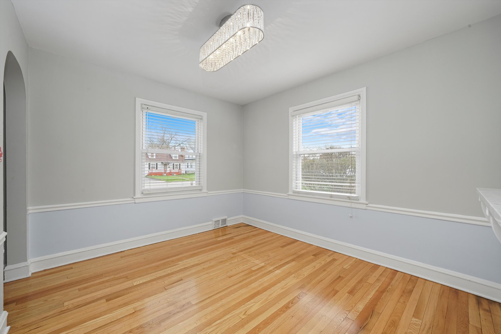 1643 183rd Street Homewood, IL 60430 - Photo 4 of 44 a view of empty room with wooden floor and fan
