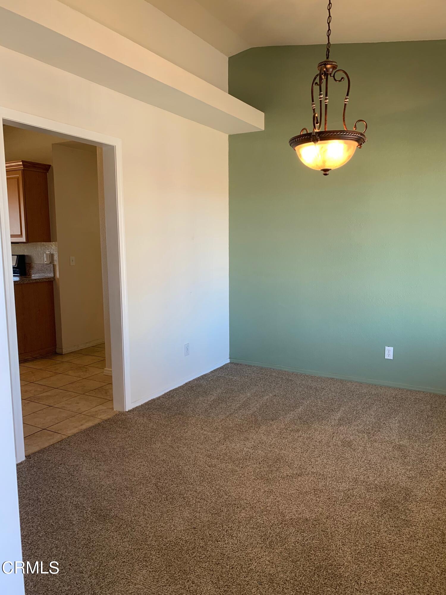 22159 Tehama Road Apple Valley, CA 92308 - Photo 13 of 26 a view of an empty room with a window