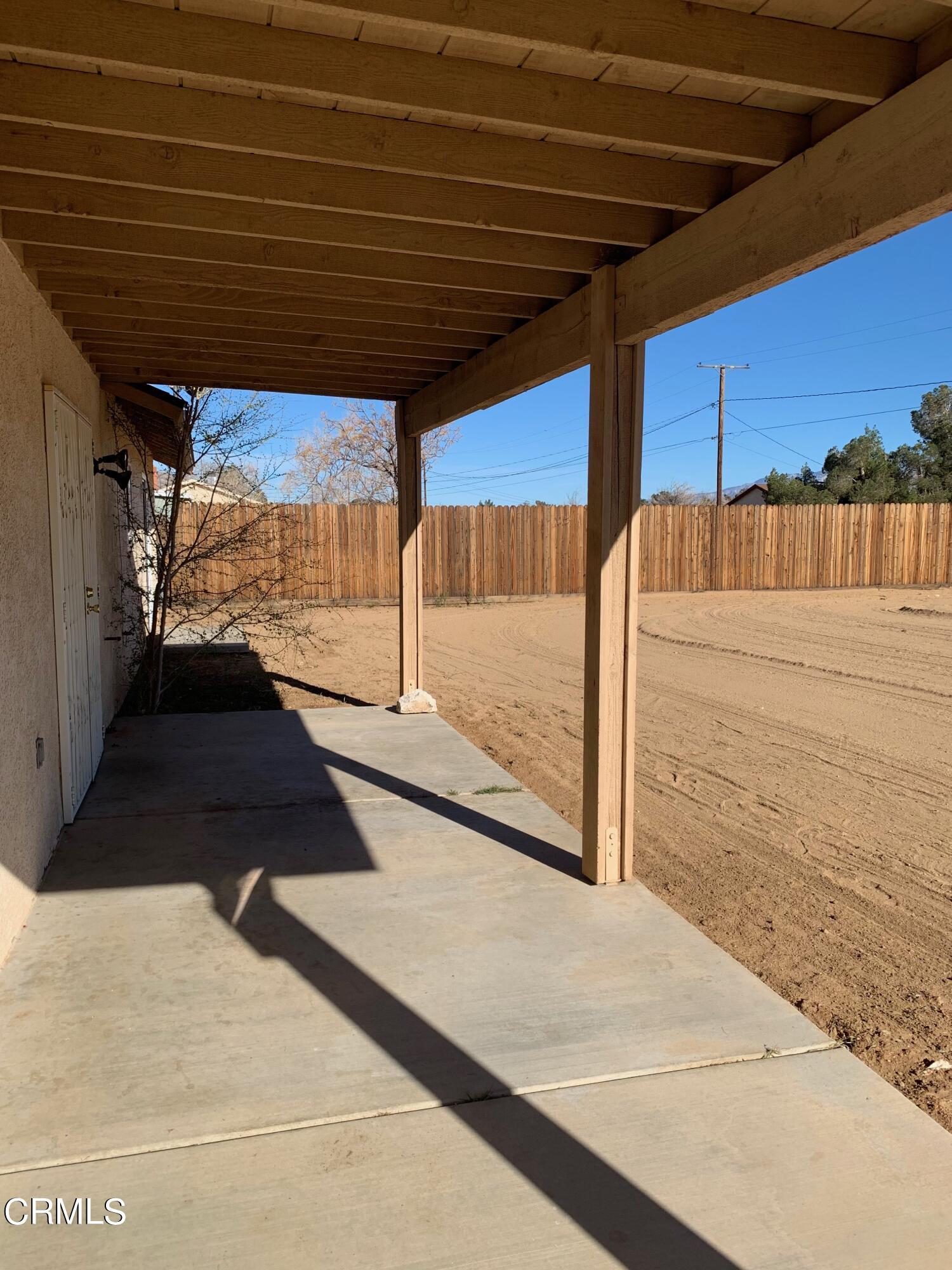 22159 Tehama Road Apple Valley, CA 92308 - Photo 23 of 26 a view of a backyard of the house