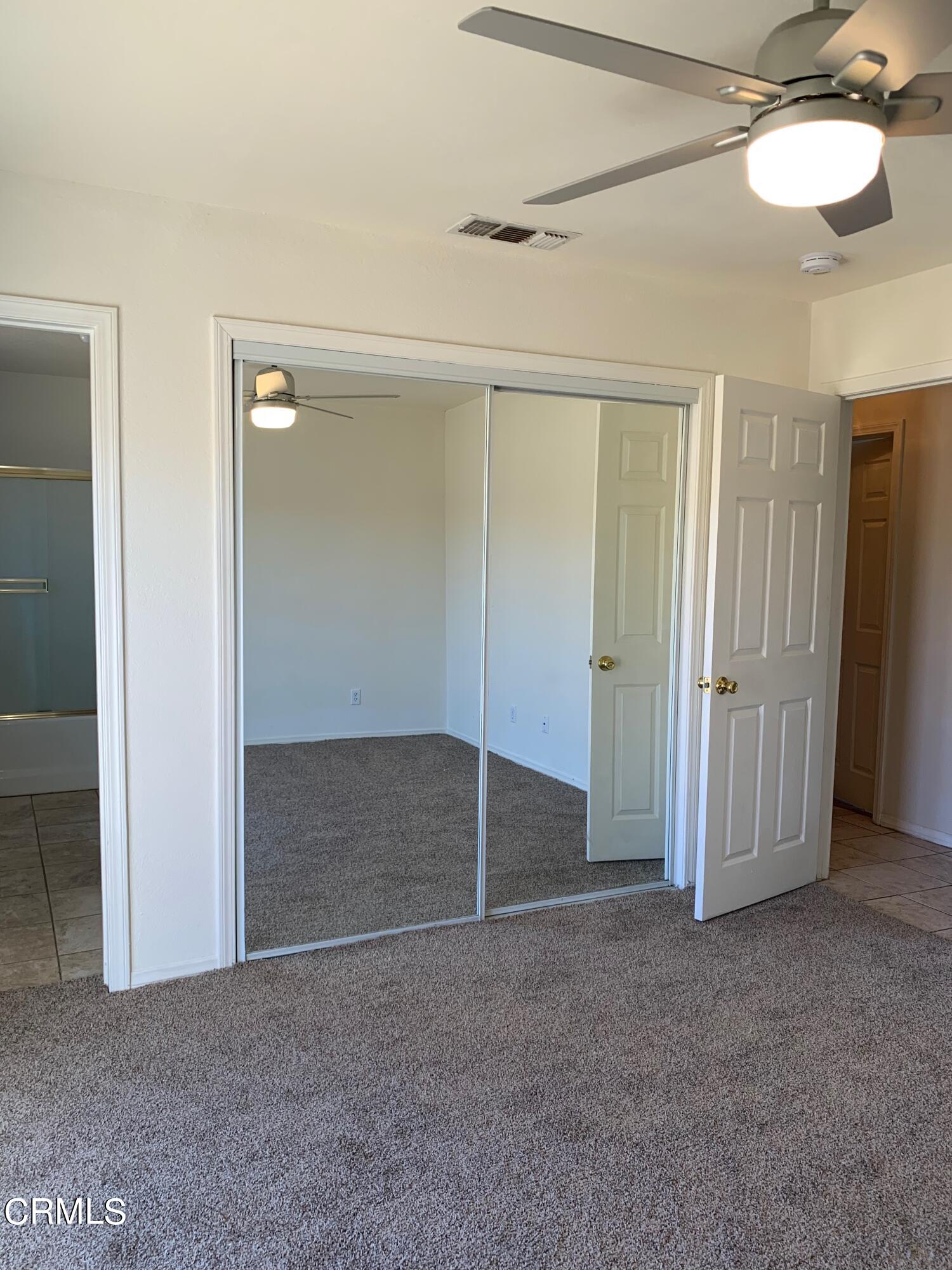 22159 Tehama Road Apple Valley, CA 92308 - Photo 24 of 26 an empty room with a bathroom