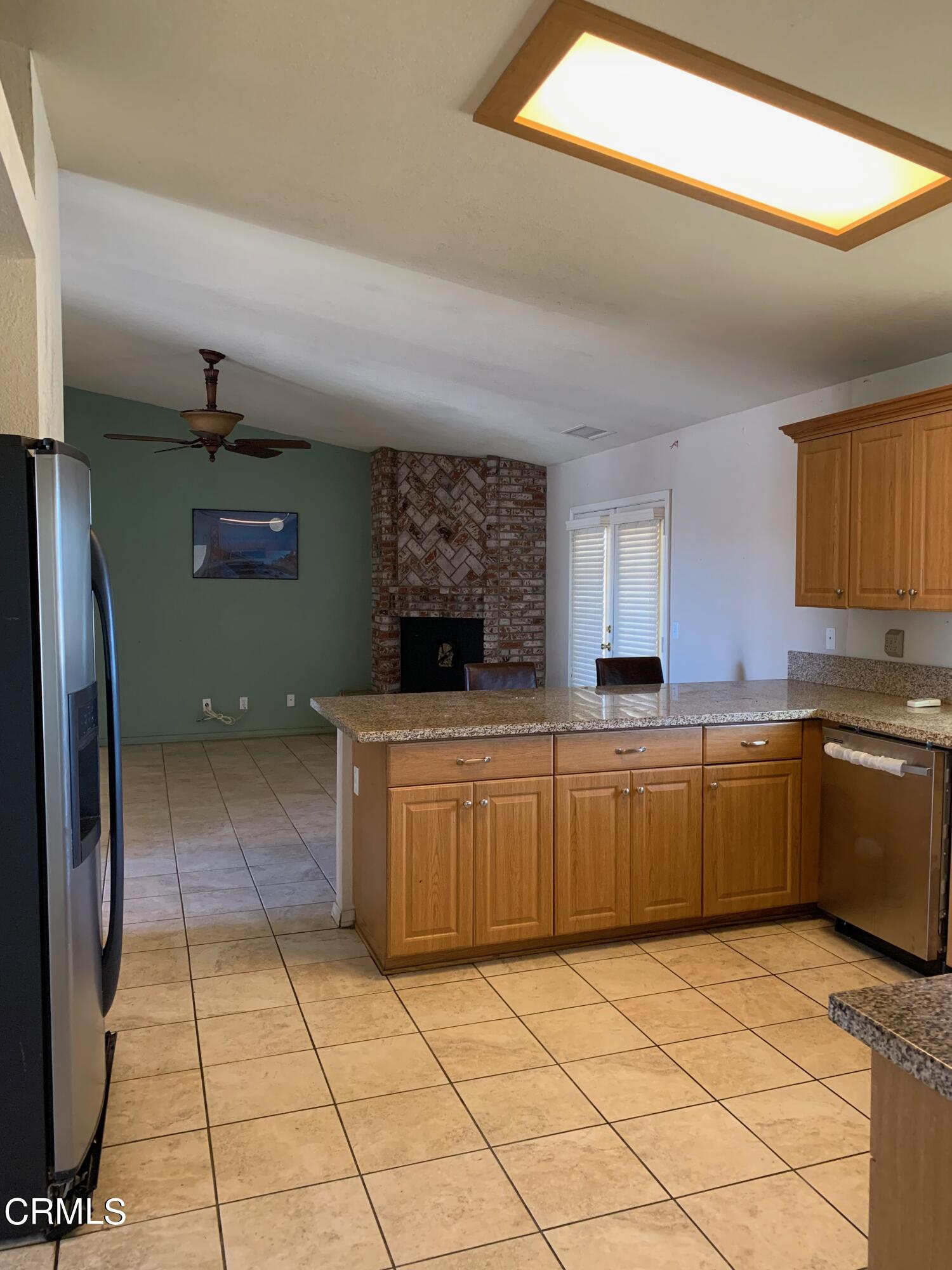 22159 Tehama Road Apple Valley, CA 92308 - Photo 7 of 26 a kitchen with a sink and cabinets