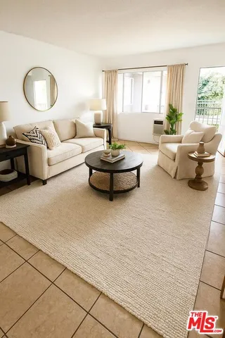 a living room with furniture and window