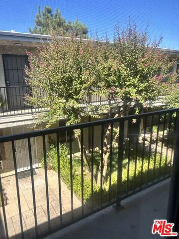 a view of a lake from a balcony