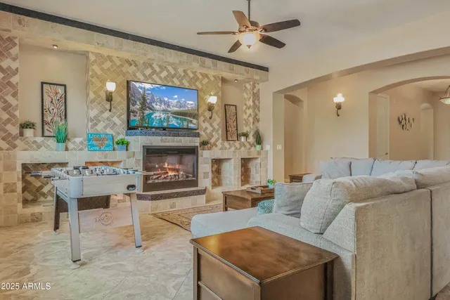 a large kitchen with a table and chairs